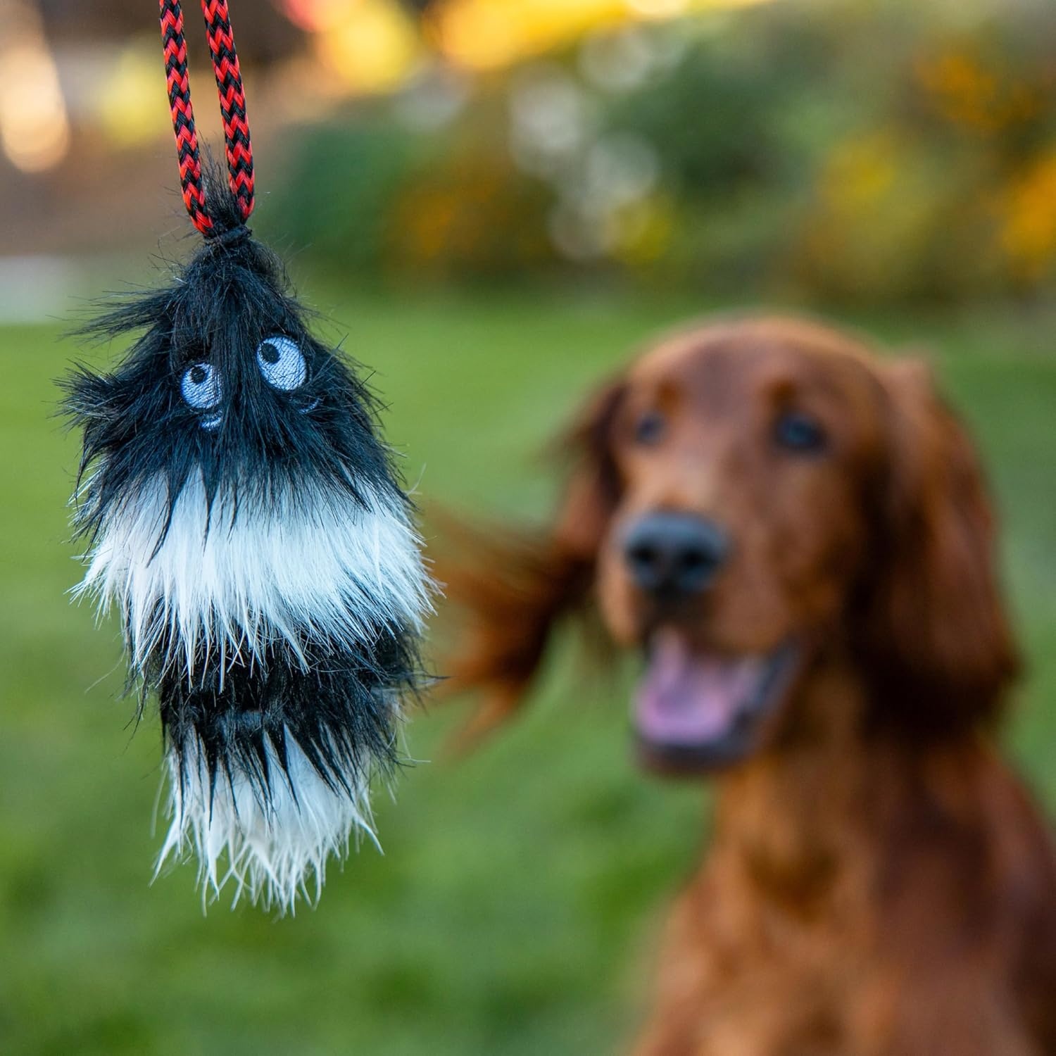 image:imageOutward Hound Tail Teaser Interactive Dog Wand Toy with Squeaky Plush Teaser and Crinkle Sounds for Active Play MulticoloredPlush